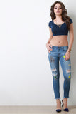 Frayed Hem Patch Skinny Jeans